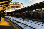 Travelers and commuters waiting for a train on the platform of Bucharest North Railway Station (Gara de Nord) in Bucharest, Romania, 2020