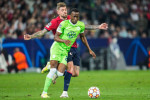 LILLE, FRANCE - SEPTEMBER 14: Dodi Lukebaio of VfL Wolfsburg and Xeka of LOSC Lille during the UEFA Champions League match between LOSC Lille and VfL Wolfsburg at Stade Pierre-Mauroy on September 14, 2021 in Lille, France (Photo by Geert van Erven/Orange