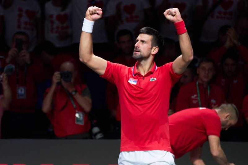 Novak Djokovic of Serbia celebrates his win over Cameron Norrie of Great Britain during the Davis Cup Final 8 match betw