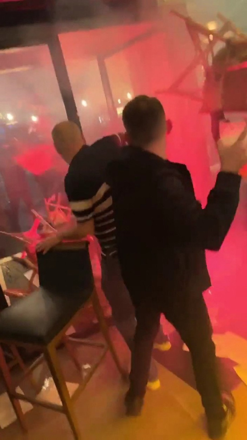 EXCLUSIVE: Violent clash between PSG and NewCastle supporters in a bar in Paris