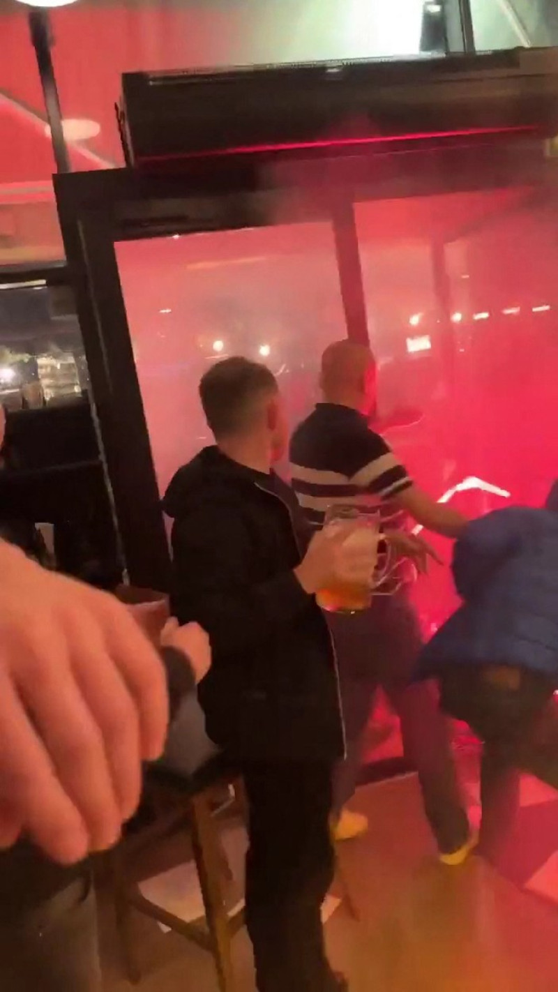 EXCLUSIVE: Violent clash between PSG and NewCastle supporters in a bar in Paris