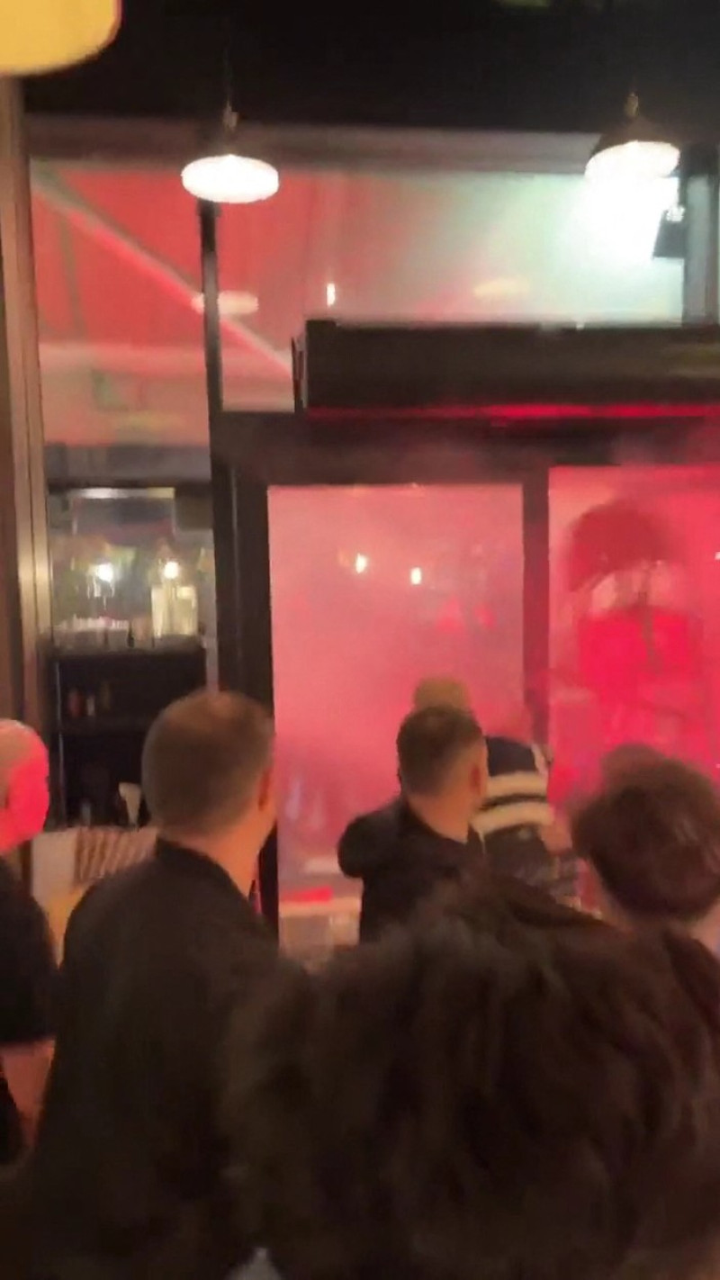 EXCLUSIVE: Violent clash between PSG and NewCastle supporters in a bar in Paris