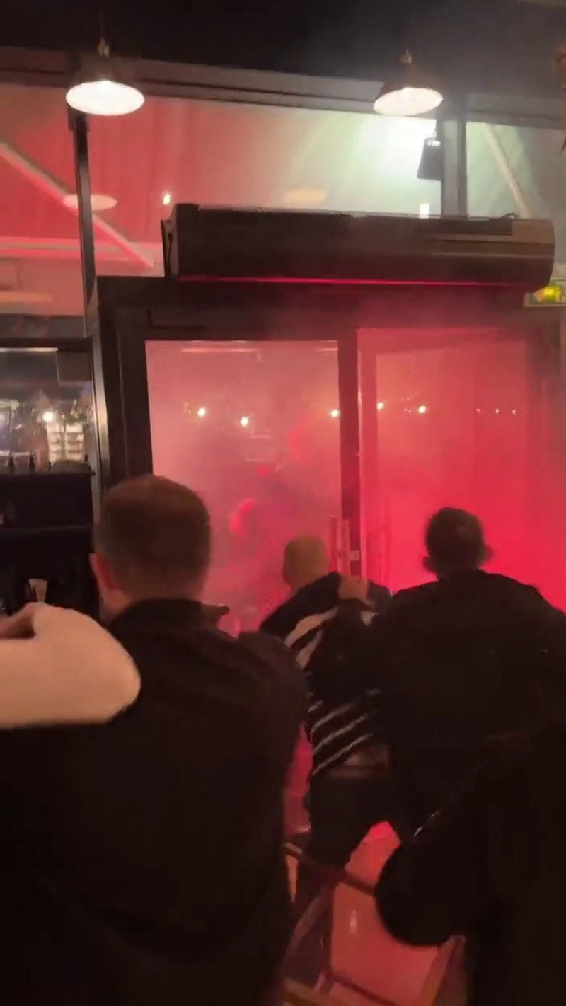 EXCLUSIVE: Violent clash between PSG and NewCastle supporters in a bar in Paris