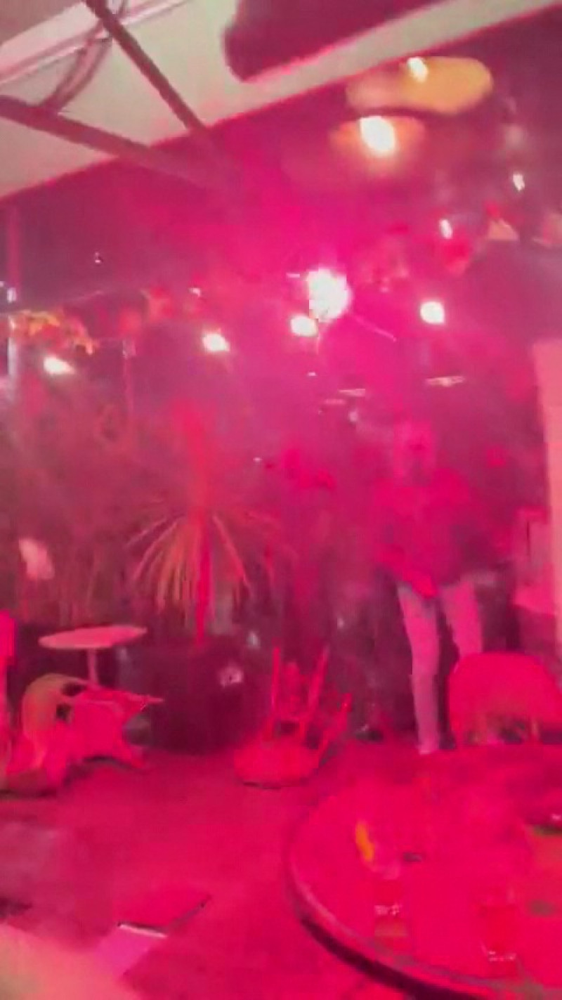 EXCLUSIVE: Violent clash between PSG and NewCastle supporters in a bar in Paris
