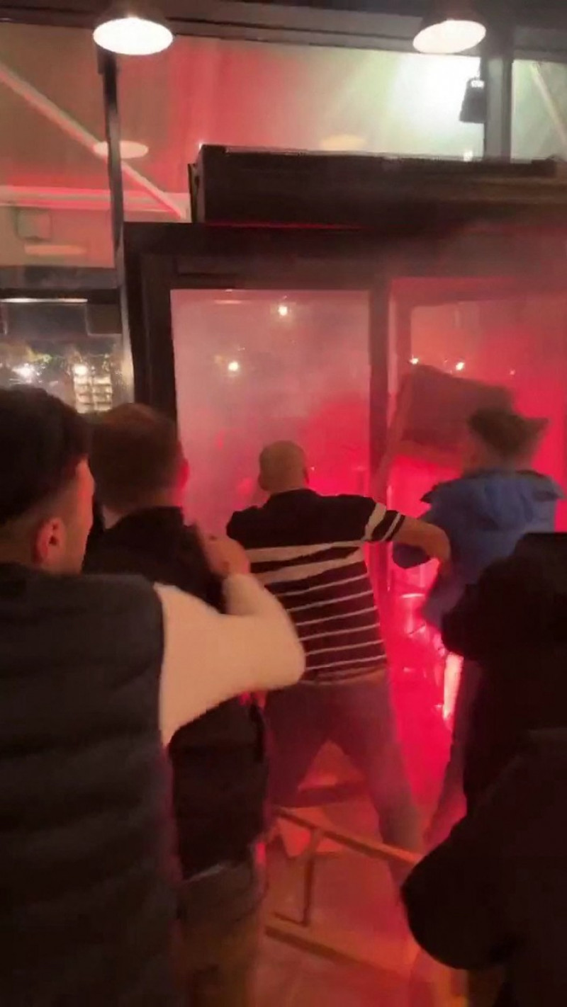 EXCLUSIVE: Violent clash between PSG and NewCastle supporters in a bar in Paris