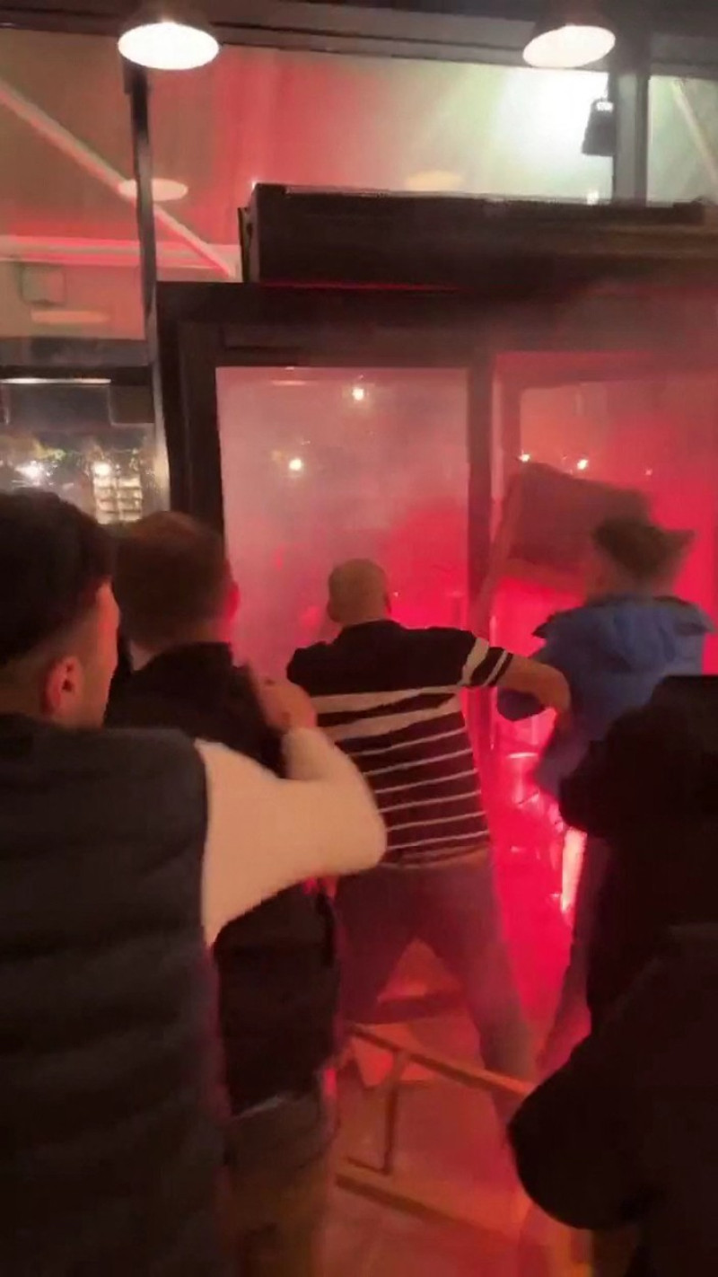 EXCLUSIVE: Violent clash between PSG and NewCastle supporters in a bar in Paris