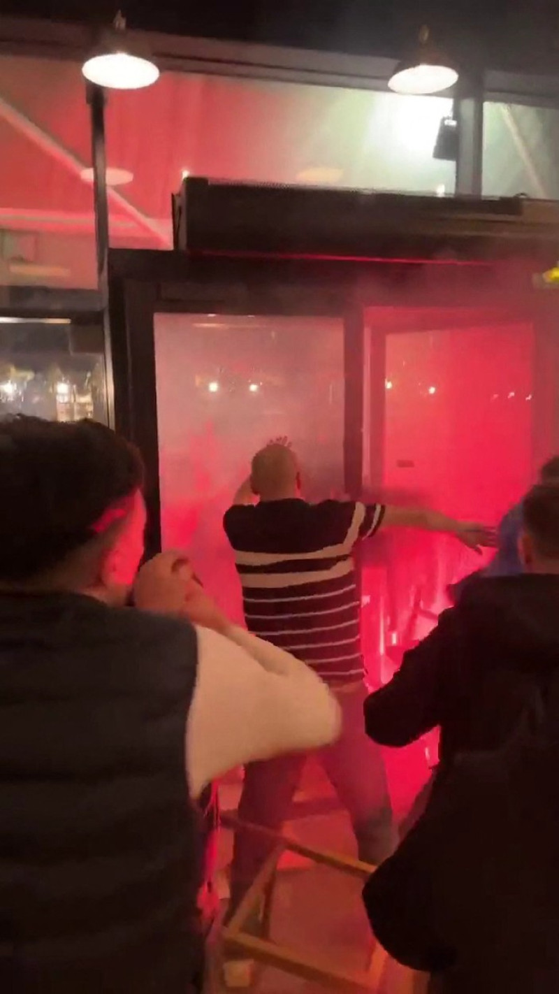 EXCLUSIVE: Violent clash between PSG and NewCastle supporters in a bar in Paris