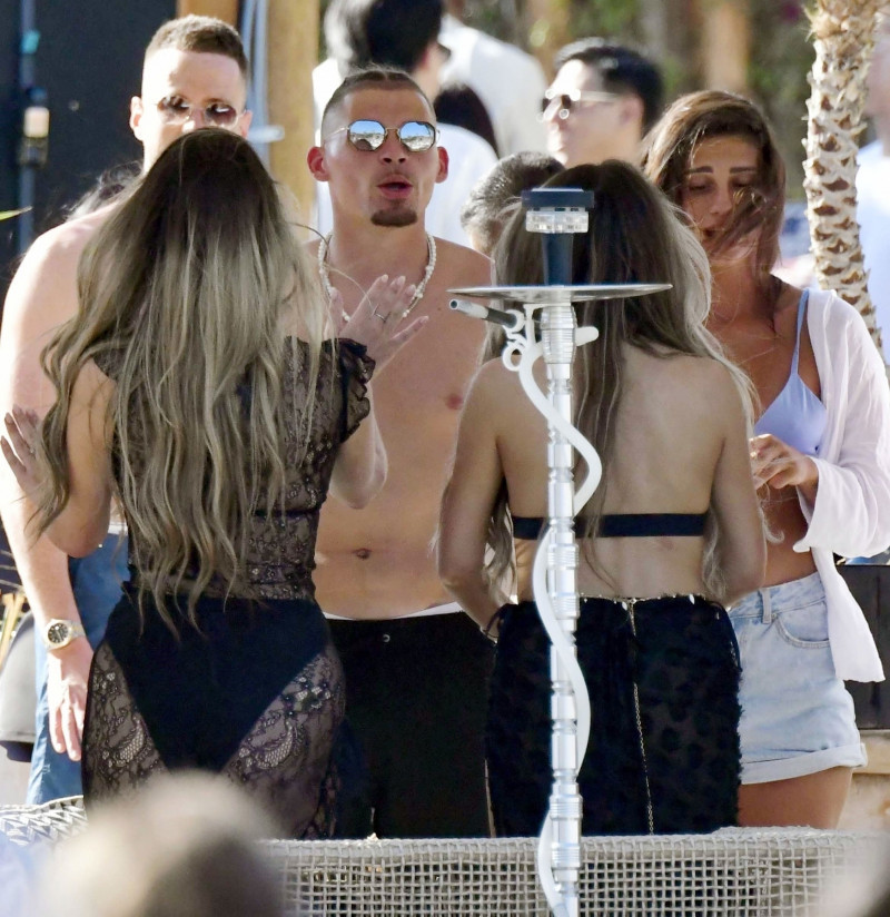 *PREMIUM-EXCLUSIVE* *MUST CALL FOR PRICING* Manchester City's England Footballer Kalvin Phillips enjoys a little flirty fun with Miss Italy's Vanessa Etemaj during his sun-soaked holiday break in Mykonos.