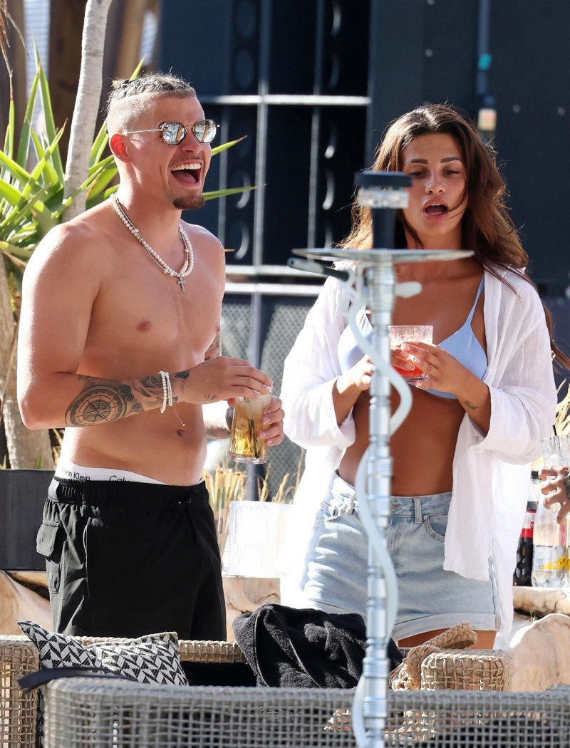 *PREMIUM-EXCLUSIVE* *MUST CALL FOR PRICING* Manchester City's England Footballer Kalvin Phillips enjoys a little flirty fun with Miss Italy's Vanessa Etemaj during his sun-soaked holiday break in Mykonos.