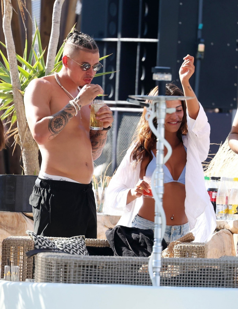 *PREMIUM-EXCLUSIVE* *MUST CALL FOR PRICING* Manchester City's England Footballer Kalvin Phillips enjoys a little flirty fun with Miss Italy's Vanessa Etemaj during his sun-soaked holiday break in Mykonos.