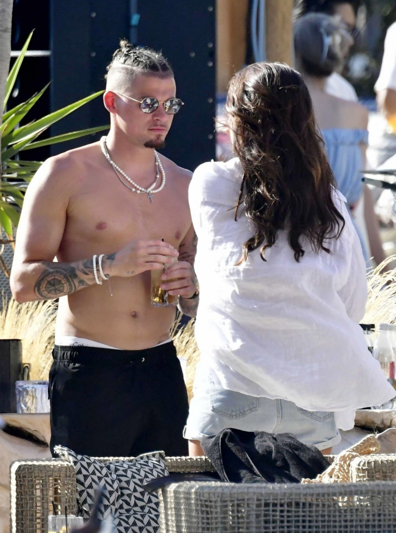 *PREMIUM-EXCLUSIVE* *MUST CALL FOR PRICING* Manchester City's England Footballer Kalvin Phillips enjoys a little flirty fun with Miss Italy's Vanessa Etemaj during his sun-soaked holiday break in Mykonos.