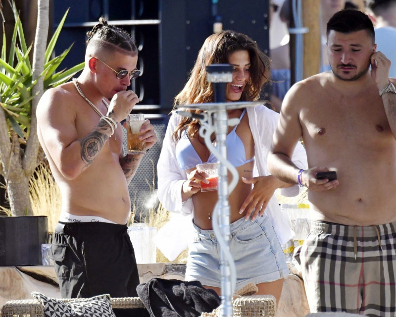 *PREMIUM-EXCLUSIVE* *MUST CALL FOR PRICING* Manchester City's England Footballer Kalvin Phillips enjoys a little flirty fun with Miss Italy's Vanessa Etemaj during his sun-soaked holiday break in Mykonos.