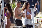 *PREMIUM-EXCLUSIVE* *MUST CALL FOR PRICING* Manchester City's England Footballer Kalvin Phillips enjoys a little flirty fun with Miss Italy's Vanessa Etemaj during his sun-soaked holiday break in Mykonos.