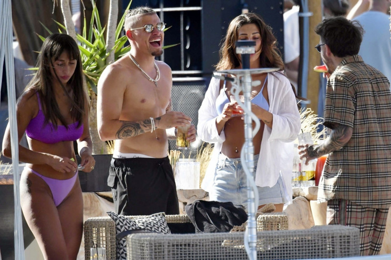 *PREMIUM-EXCLUSIVE* *MUST CALL FOR PRICING* Manchester City's England Footballer Kalvin Phillips enjoys a little flirty fun with Miss Italy's Vanessa Etemaj during his sun-soaked holiday break in Mykonos.