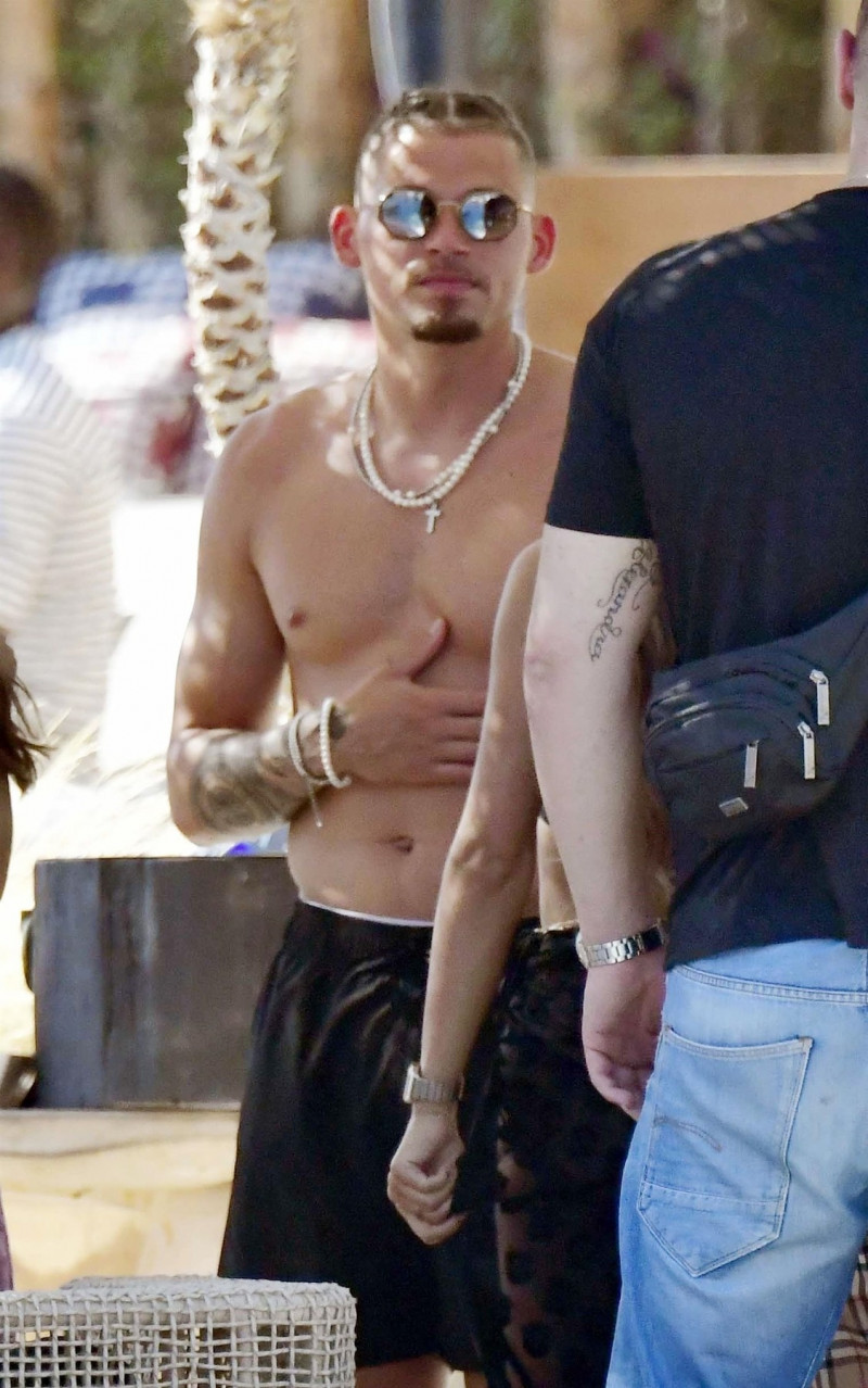 *PREMIUM-EXCLUSIVE* *MUST CALL FOR PRICING* Manchester City's England Footballer Kalvin Phillips enjoys a little flirty fun with Miss Italy's Vanessa Etemaj during his sun-soaked holiday break in Mykonos.