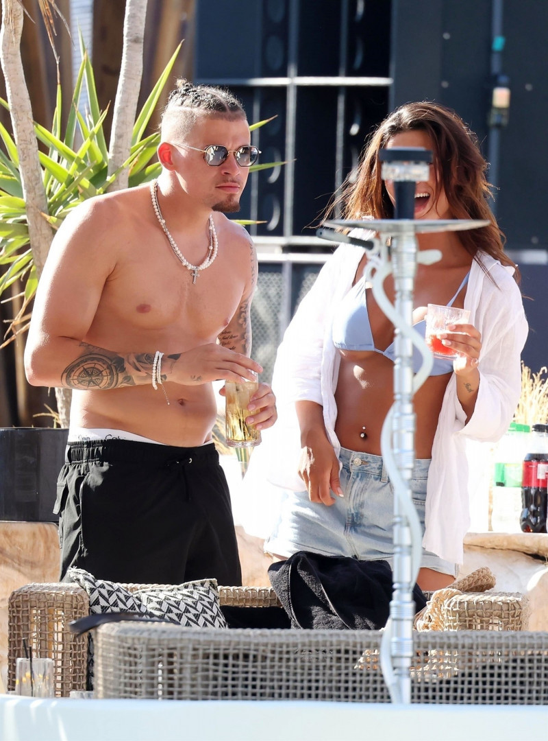 *PREMIUM-EXCLUSIVE* *MUST CALL FOR PRICING* Manchester City's England Footballer Kalvin Phillips enjoys a little flirty fun with Miss Italy's Vanessa Etemaj during his sun-soaked holiday break in Mykonos.