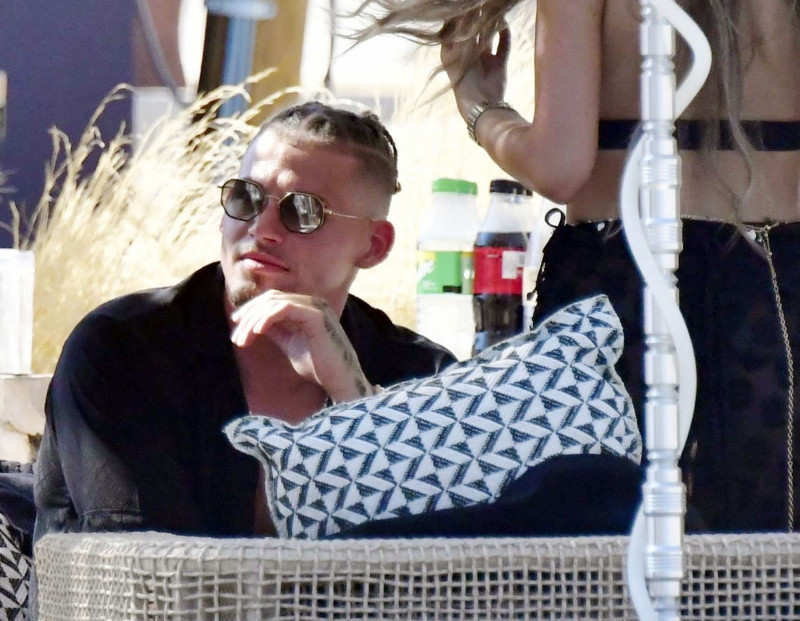 *PREMIUM-EXCLUSIVE* *MUST CALL FOR PRICING* Manchester City's England Footballer Kalvin Phillips enjoys a little flirty fun with Miss Italy's Vanessa Etemaj during his sun-soaked holiday break in Mykonos.