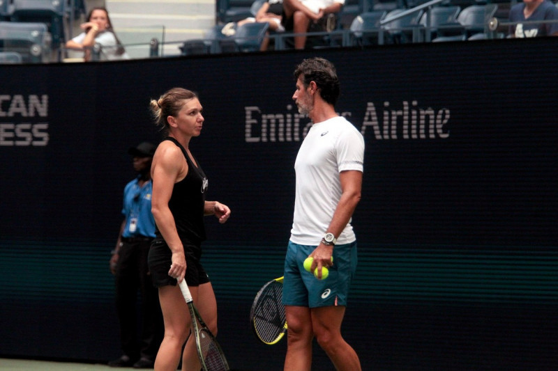 Flushing Meadows, New York, USA. 23rd Aug, 2022. Romania's Simona Halep shares a moment with new coach, Patrick Mouratoglou while practicing for the U.S. Open today at the National Tennis Center in Flushing Meadows, New York. The tournament begins next Mo
