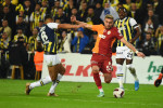 Bright Osayi Samuel (21) of Fenerbahce and Baris Alper Yilmaz of Galatasaray during the Turkish Super League Derby match