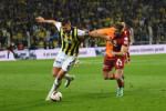 Edin Dzeko (9) of Fenerbahce and Baris Alper Yilmaz of Galatasaray during the Turkish Super League Derby match between F