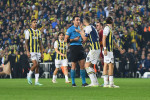Edin Dzeko of Fenerbahcereacts to referee Arda Kardesler during the Turkish Super League Derby match between Fenerbahce