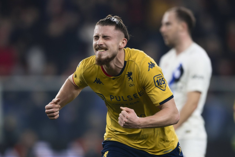 Genoa CFC v FC Internazionale - Serie A Radu Dragusin of Genoa CFC celebrates after scoring a goal a Carlos Augusto of F
