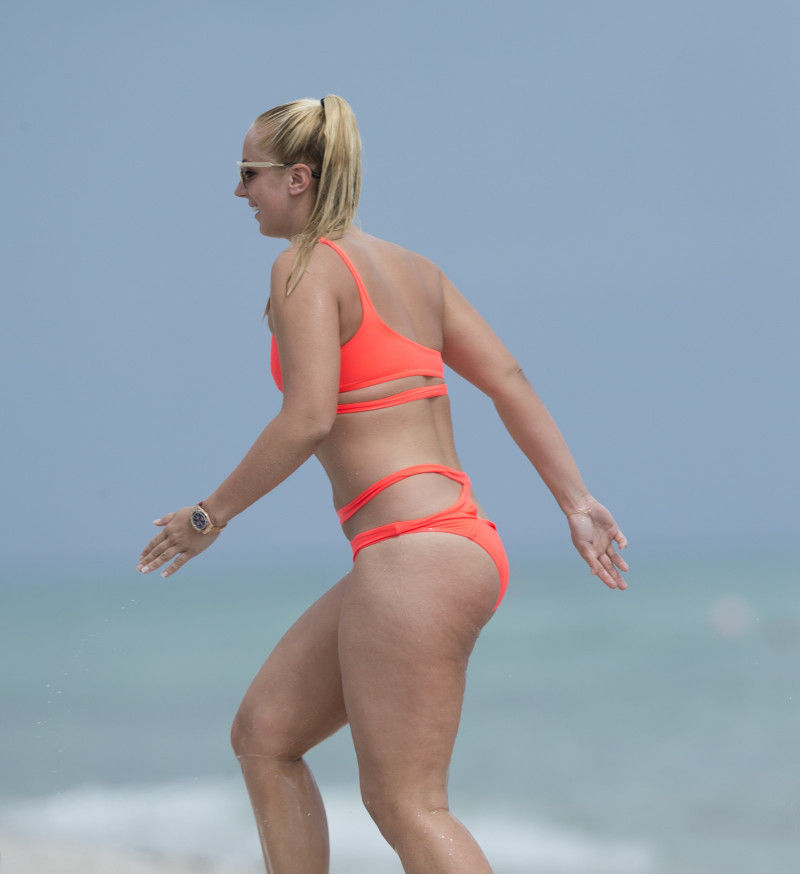 EXCLUSIVE: Tennis star Sabine Lisicki enjoys a day on Miami beach with a friend