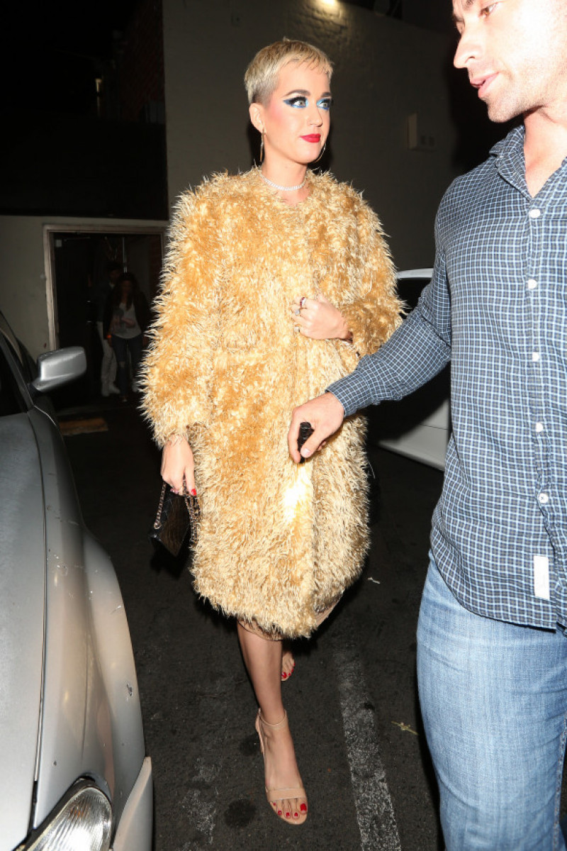 Singer Katy Perry is dressed in 1930's fashion style as she leaves the Delilah club at 2:30 A.M. in the morning