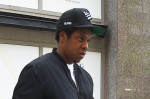 Jay-Z leaving Securities and Exchange Commission office in New York