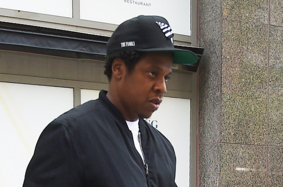 Jay-Z leaving Securities and Exchange Commission office in New York