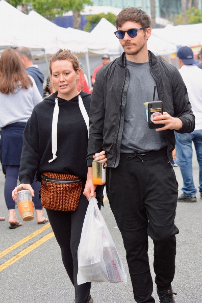 She's eating for two! Hilary Duff shows off her baby bump with partner Matthew Koma