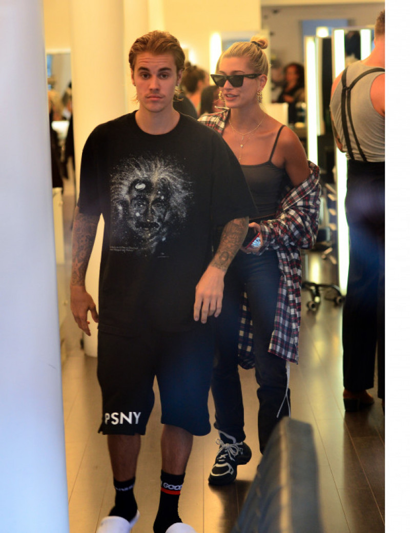Justin Bieber and Hailey Baldwin all smiles hanging inside salon together while he gets hair cut in New York