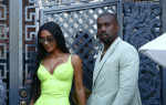 Kim Kardashian gets a helping hand from her man Kanye West while they grab ice cream
