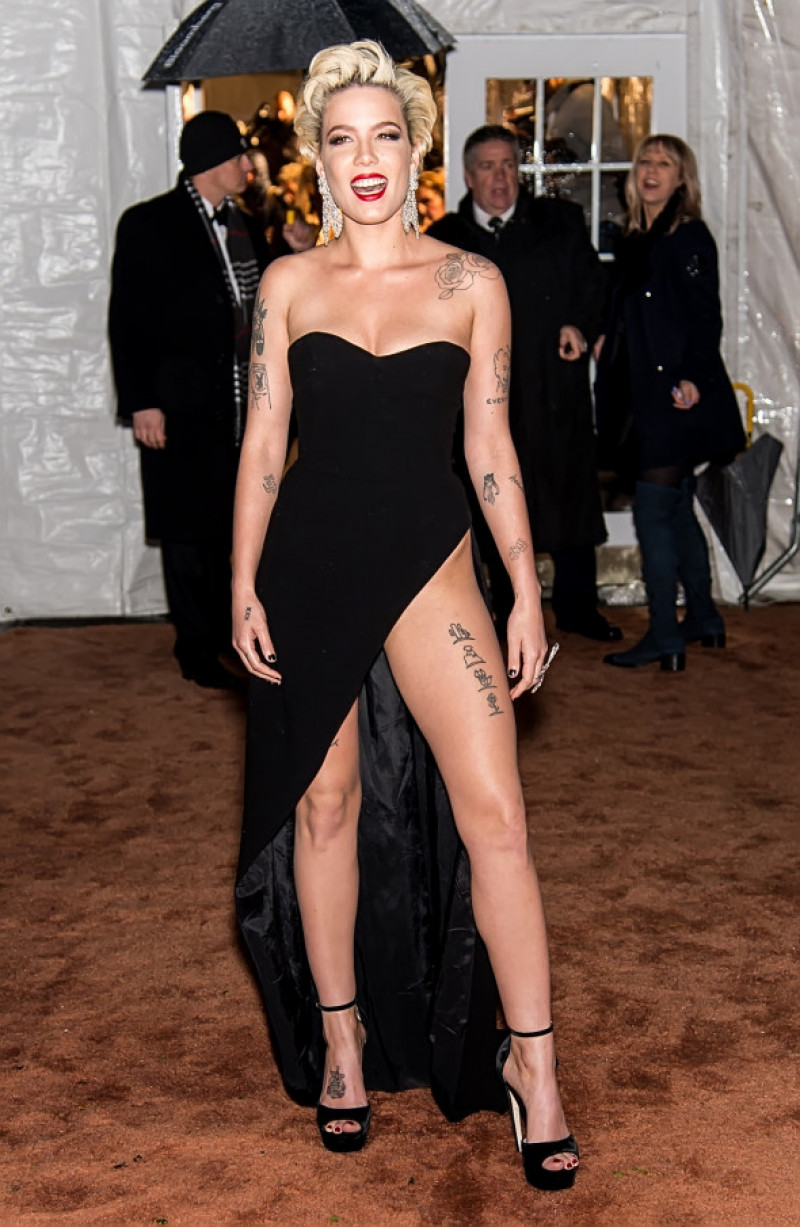 Halsey shows black underwear as she arrives at amfAR Gala New York