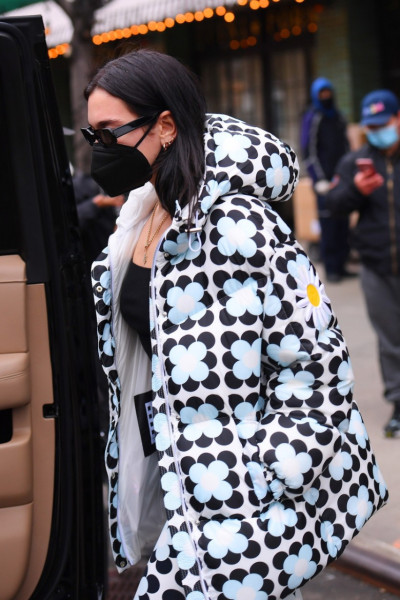 Dua Lipa heads out wearing black and white in NYC