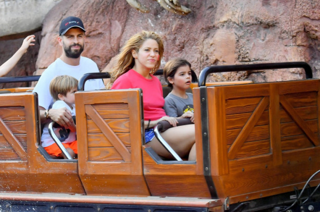 EXCLUSIVE: Shakira and her boyfriend Gerard Pique enjoy a day at Disneyland with their kids