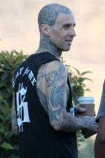 EXCLUSIVE: Travis Barker grabs coffee and getting into another G-Wagon