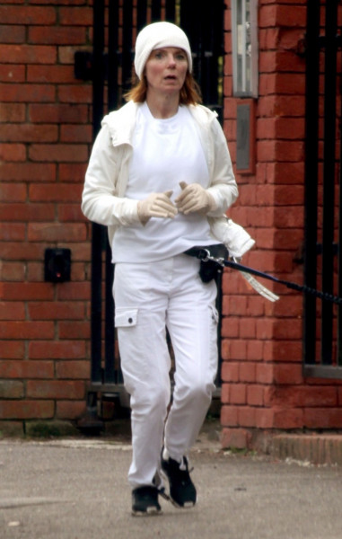 *EXCLUSIVE* WEB MUST CALL FOR PRICING - Former Spice Girl Geri Horner goes jogging out in Hampstead with her pet pooch during the COVID-19 lockdown.*PICTURES TAKEN ON 08/03/2021*