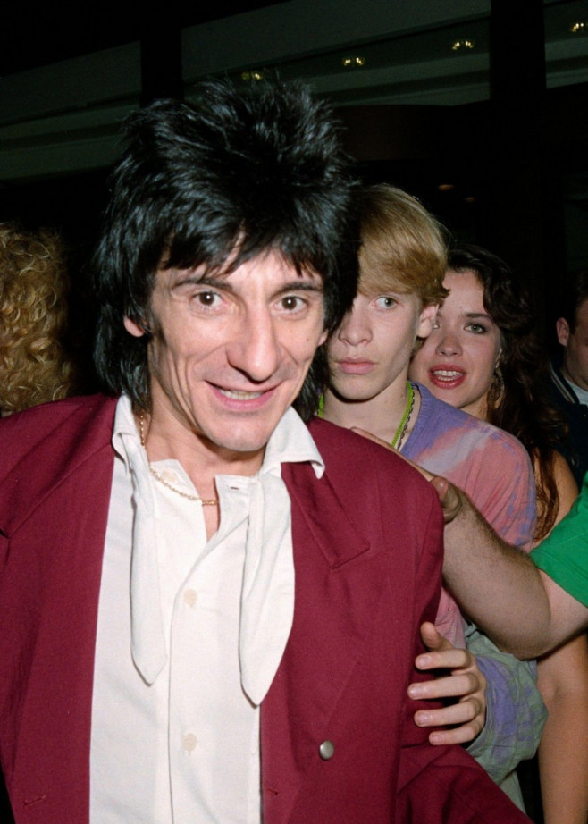 LONDON, UK. August 25, 1990: Rolling Stones star Ronnie Wood leaving Langan's Restaurant, London.File photo © Paul Smith/Featureflash