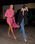 Hailey Bieber Turns Heads in Hot Pink Mini Dress with Matching Jacket As She Struts Into Dinner with Stylist Maeve Reilly