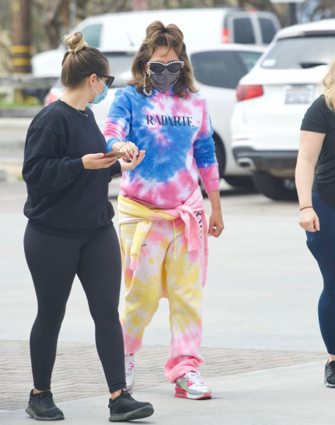 EXCLUSIVE: Lady Gaga Turns Heads In Colorful Tie Dye Sweatsuit As She Reunites With Boyfriend Michael Polansky After Months Of Filming In Rome.