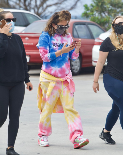 EXCLUSIVE: Lady Gaga Turns Heads In Colorful Tie Dye Sweatsuit As She Reunites With Boyfriend Michael Polansky After Months Of Filming In Rome.