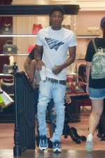 EXCLUSIVE: NBA YoungBoy Was Seen Shopping At Gucci With A Mystery Woman In Los Angeles
