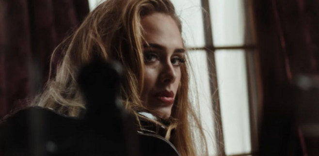 Adele returns with a video preview for her new song 'Easy on Me'