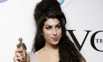 File photo dated 24/05/07 of Amy Winehouse after winning the Best Contemporary song award for her song 'Rehab' at the Ivor Novello Awards, at the Grosvenor House Hotel in cental London. Fans will mark 1 years since her death on Friday. Issue date: Friday