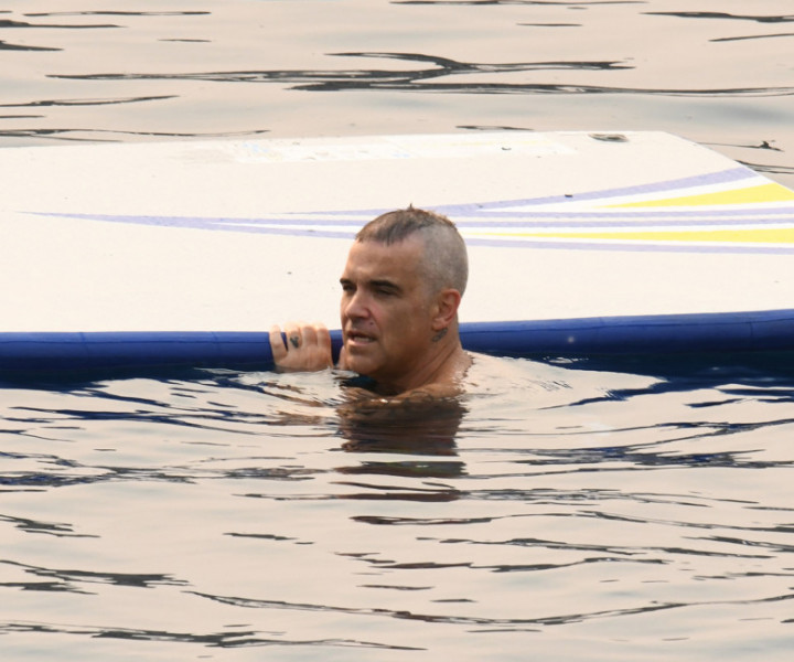 EXCLUSIVE: * NO WEB BEFORE 10PM BST 8TH AUG 2021 * Like Father, Like Son! Robbie Williams Sports Matching Mohawk To Son Charlton As The Family Are Spotted On Holiday In Turkey