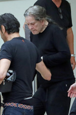 *EXCLUSIVE* Ozzy Osbourne gets some help down the stairs as he exits Milk Studios in LA