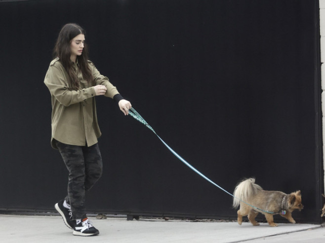 EXCLUSIVE: Aimee Osbourne spotted out walking her pup the day after escaping deadly blaze at Hollywood studio.