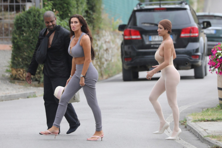 *PREMIUM-EXCLUSIVE* *MUST CALL FOR PRICING* Controversial rapper Kanye West is seen with his wife Bianca Censori who rocks a see-through outfit while out in Tuscany.