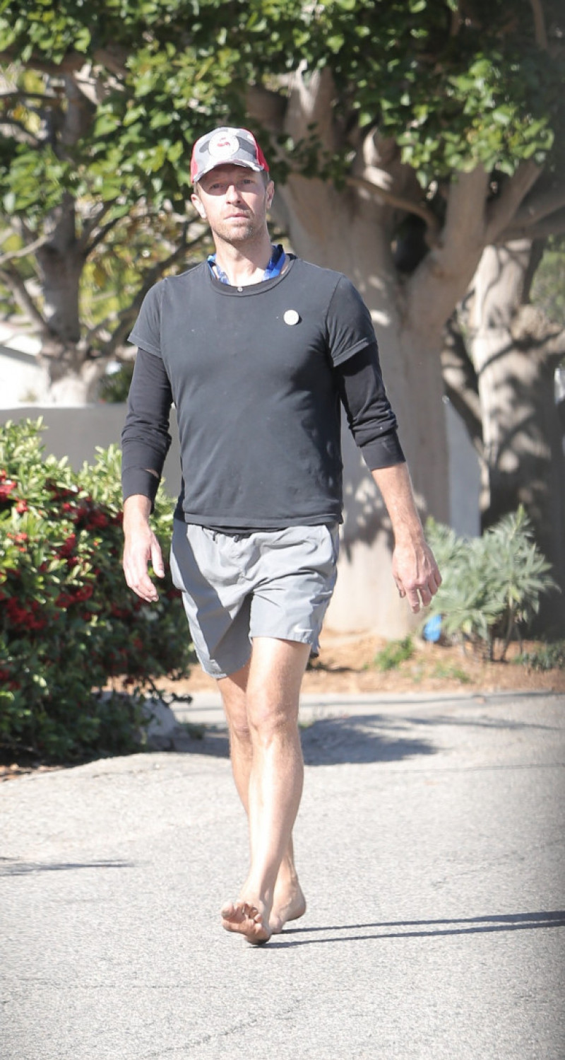 Chris Martin wanders the streets of Malibu totally barefoot as he enjoys some down time without his longtime girlfriend Dakota Johnson.